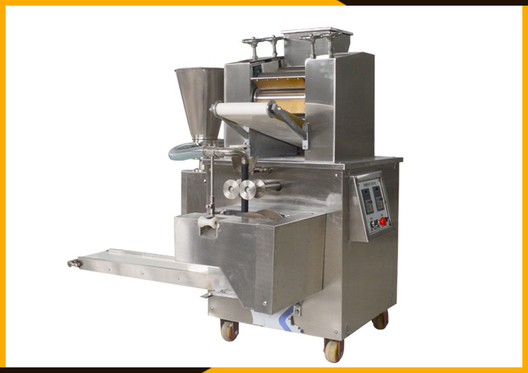 Automatic dumpling and empanadas making machine 